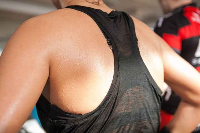 sweat skin of a woman's back