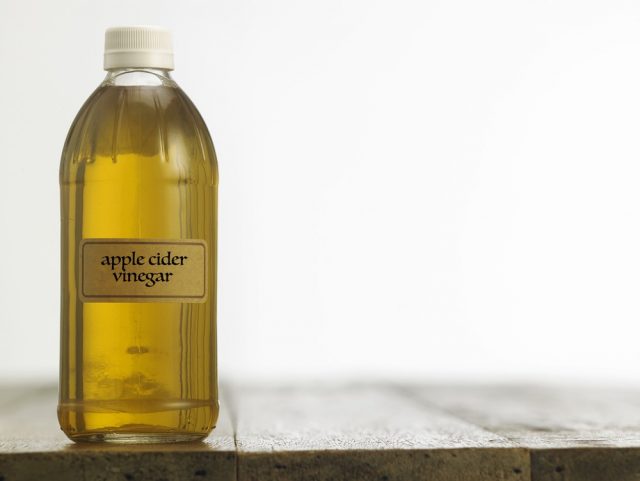 Bottle of clear filtered Apple Cider Vinegar