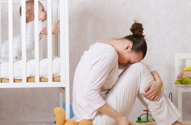 Young mother between 30 and 40 years old is experiencing postpartum depression