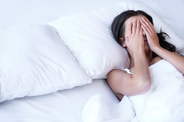 Loss of sleep: Depressed women in bed