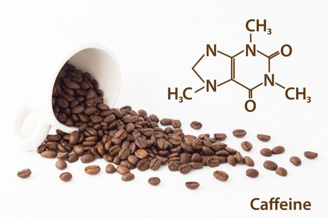 Chemical formula of Caffeine with roasted coffee spill out of cup