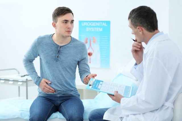 Patient talking with doctor at hospital