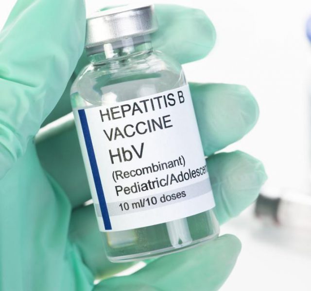 Hypothetical Hepatitis B vaccine held by nurse